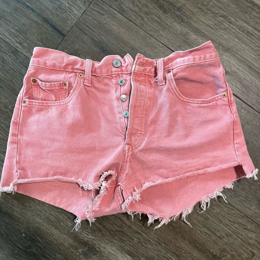 Pink Distressed Levi’s Shorts